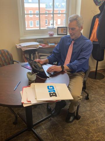 John at work in his OFA office.